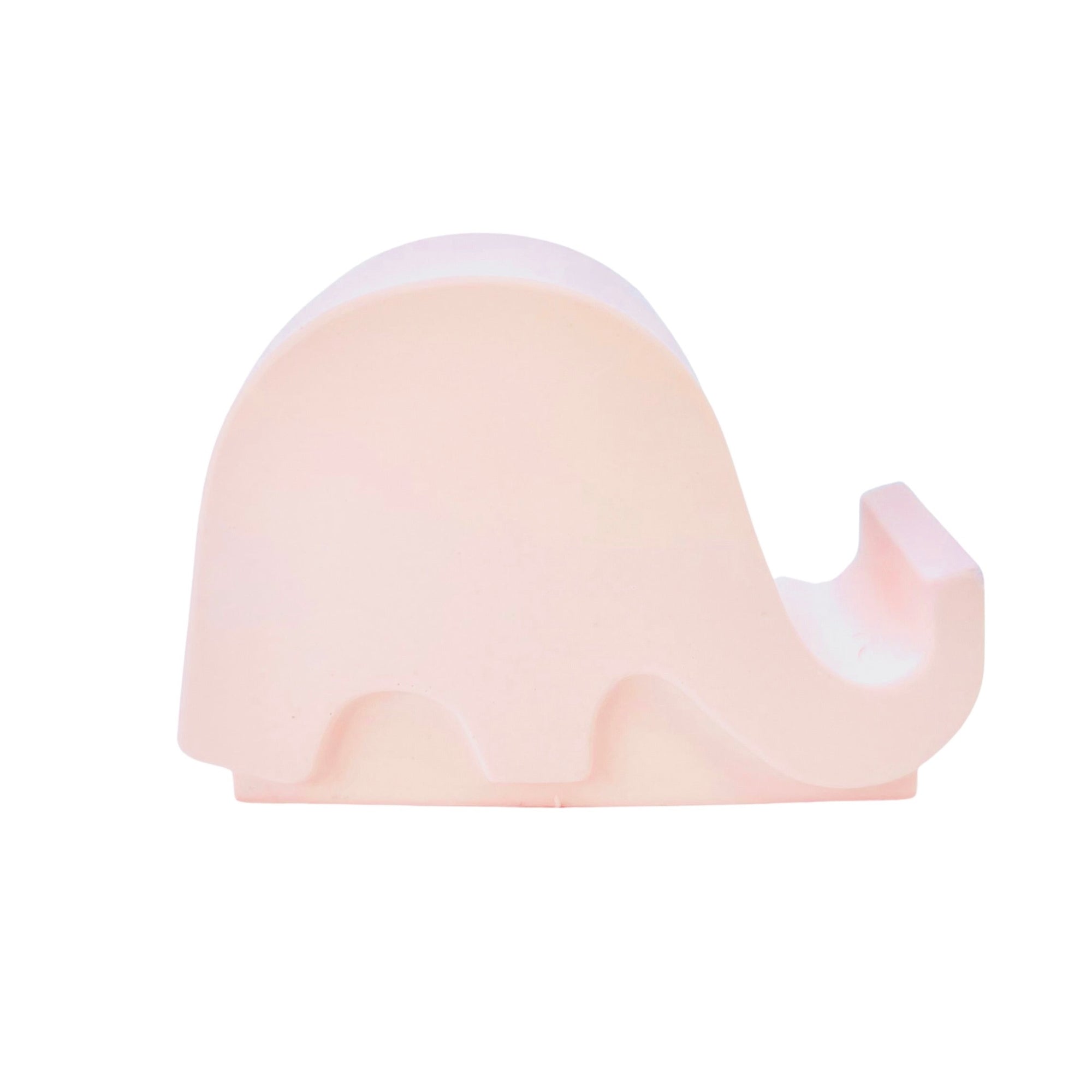 A Jesmonite elephant mobile phone stand measuring 6.5cm in length with baby pink pigment.