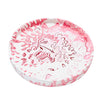 A circular Jesmonite trinket tray measuring 15.4cm in diameter marbled with red pigment.