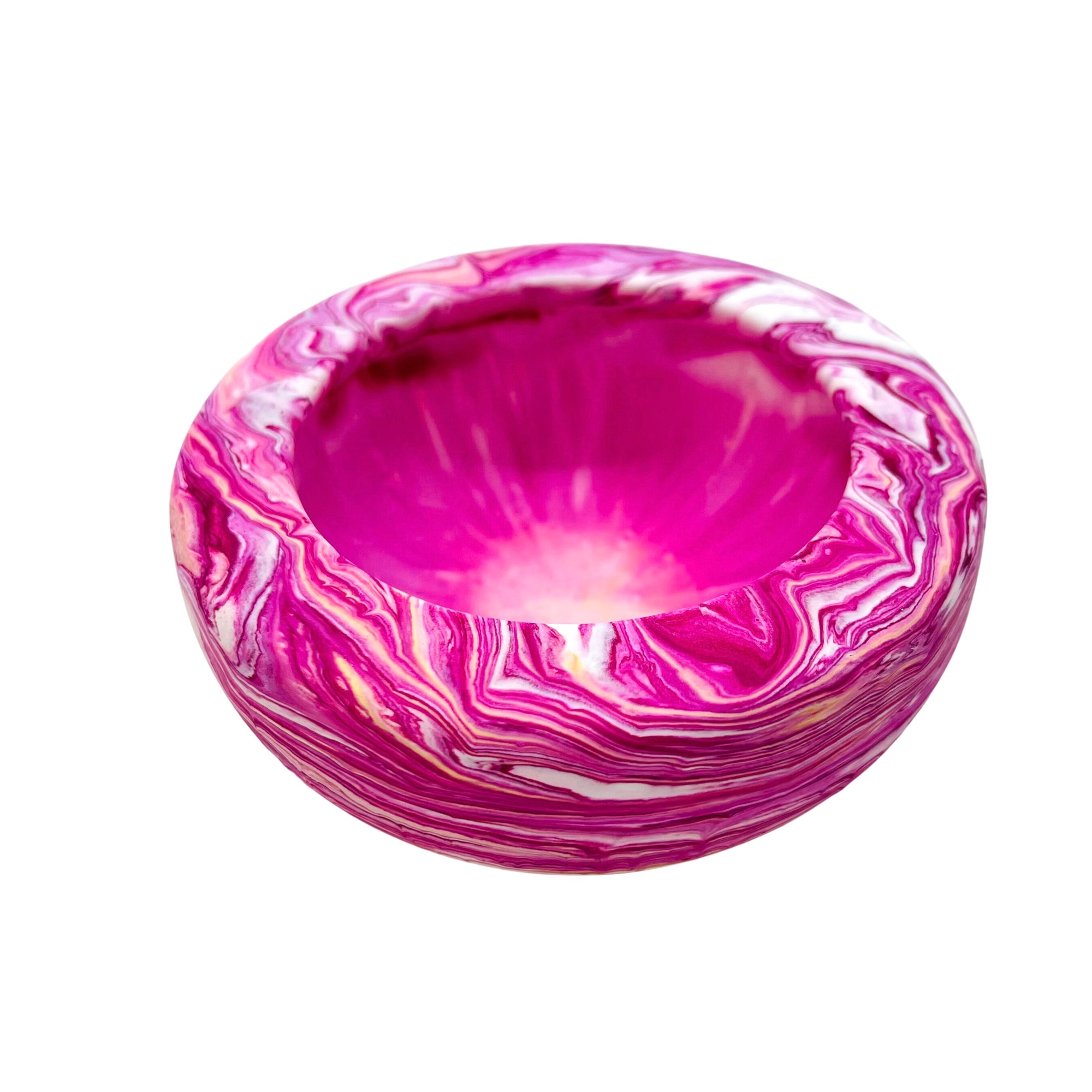 This small round jesmonite bowl measuring 10cm in diameter is marbled with magenta pigment.
