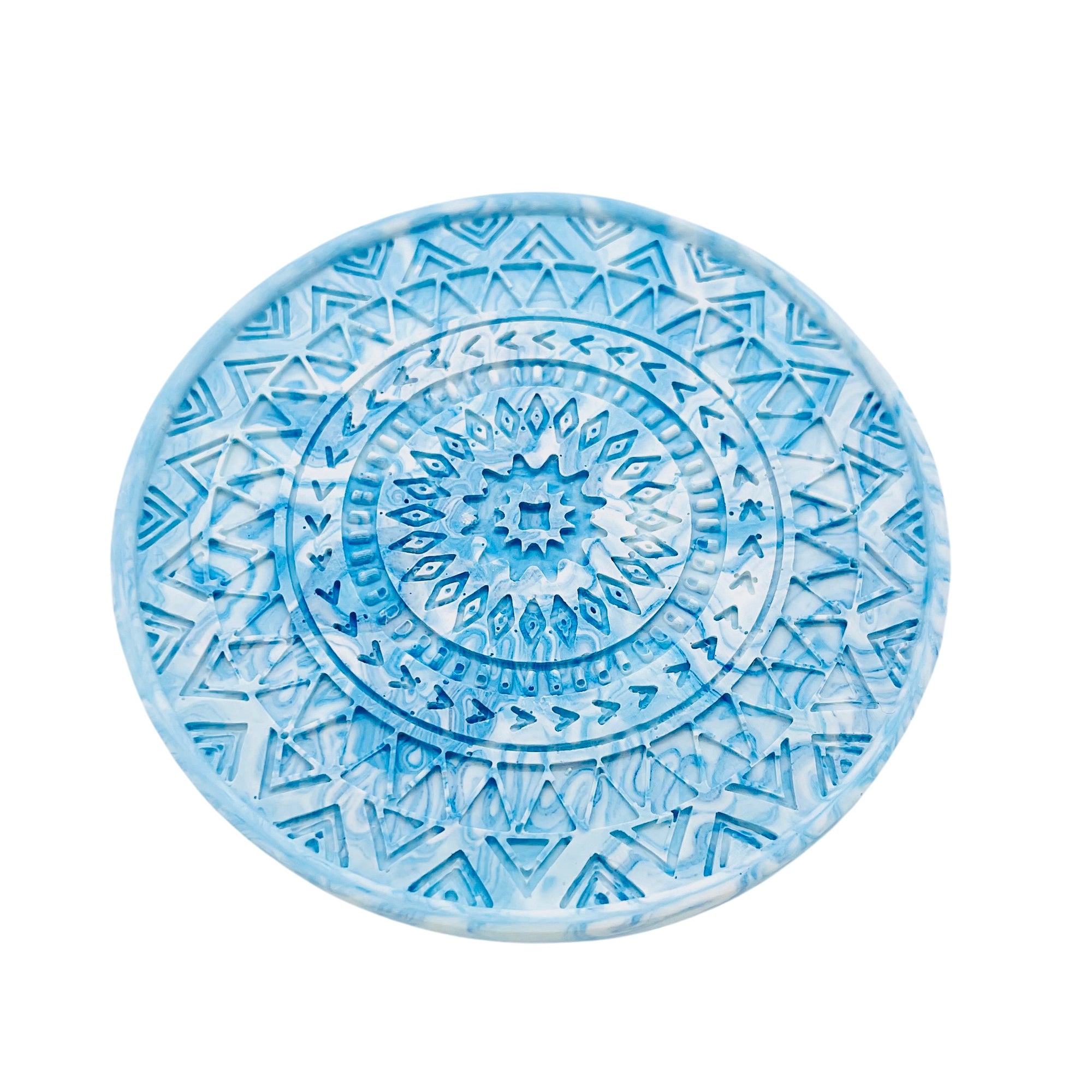  circular mandela Jesmonite coaster measuring 9.3cm in diameter and 0.8 cm in height marbled with baby blue pigment.