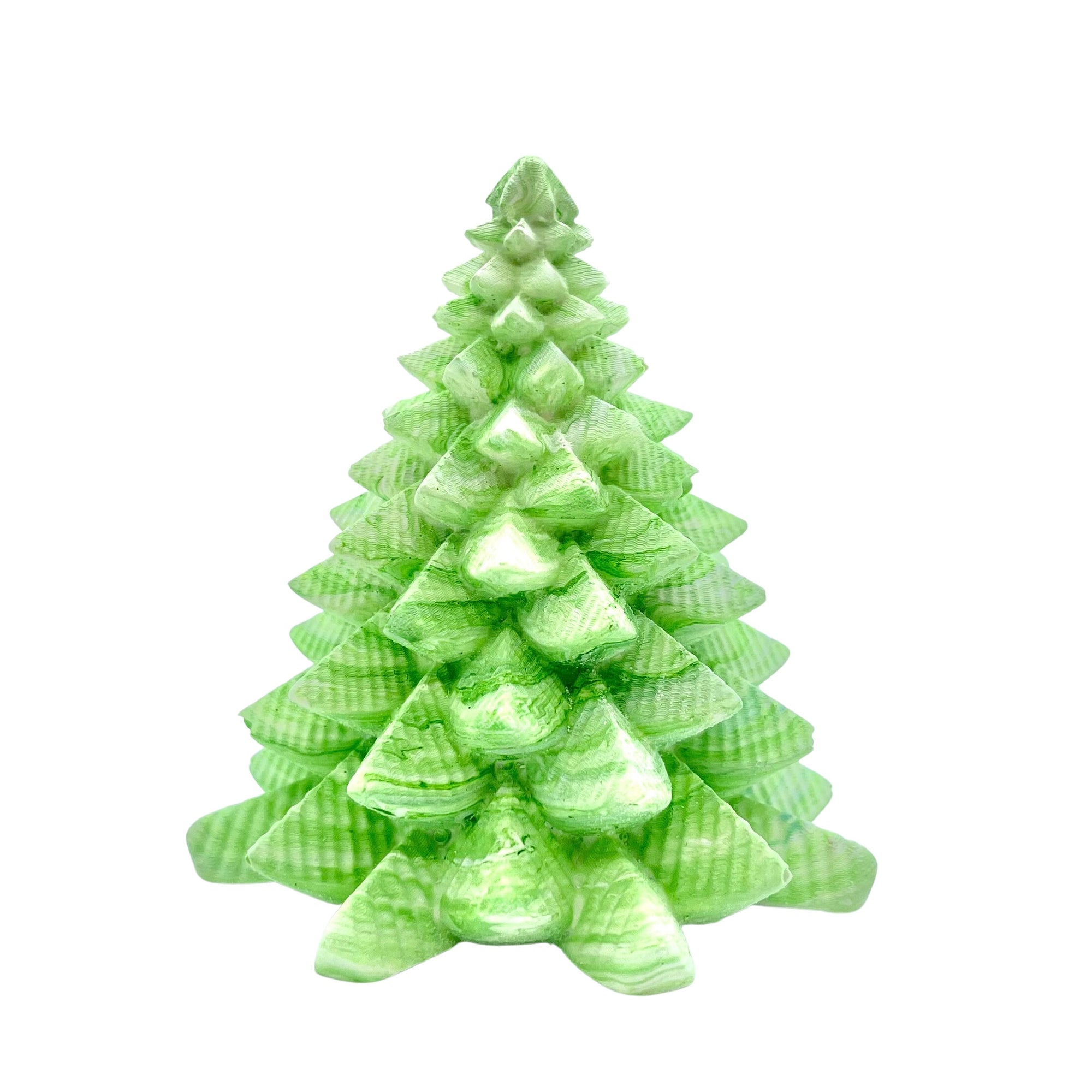 A small Jesmonite Christmas tree measuring 8.5cm tall and 7.5cm wide marbled with green pigment.