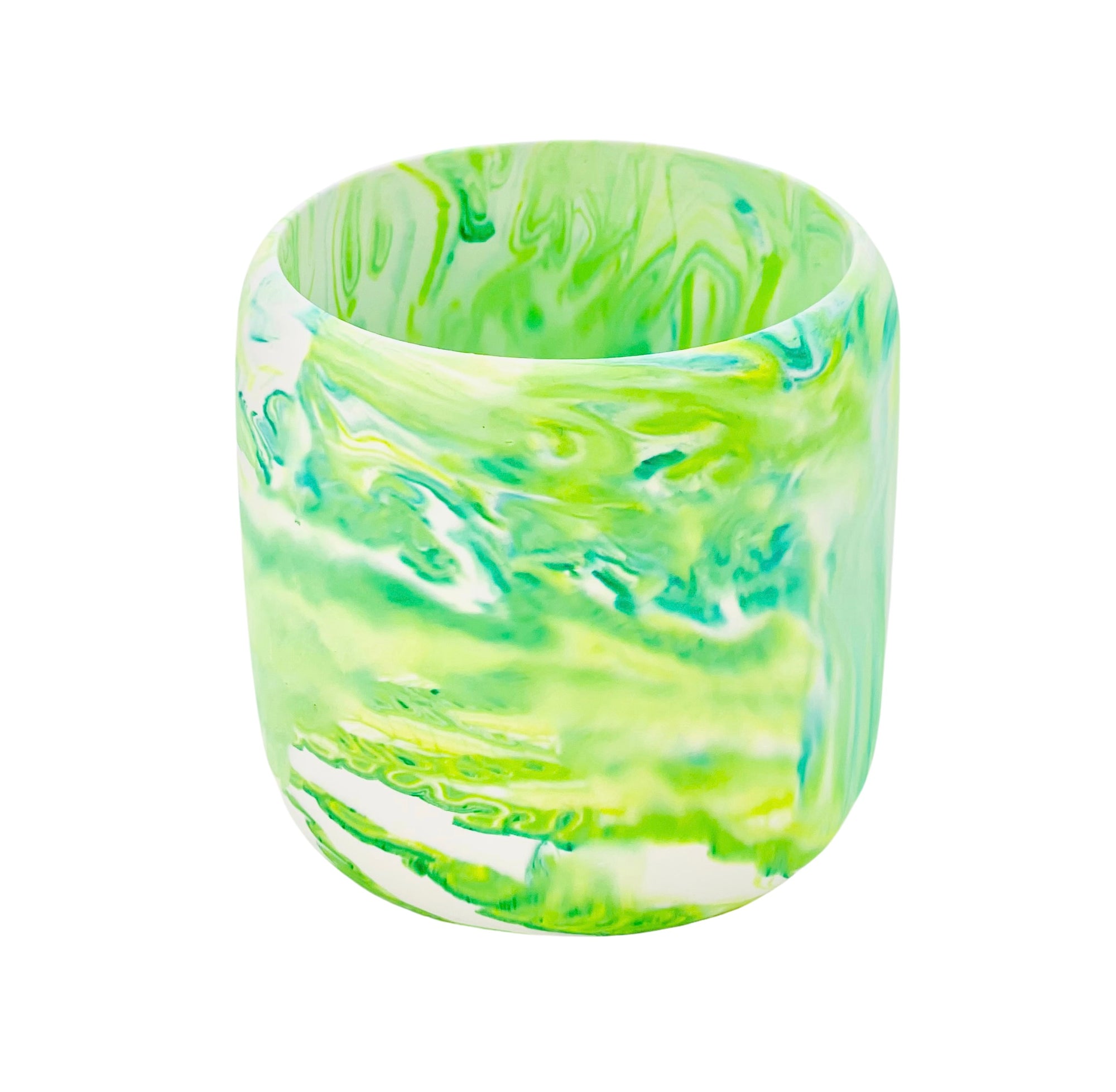 A Jesmonite tumbler with a 8.50cm diameter marbled with green and lime green pigment.