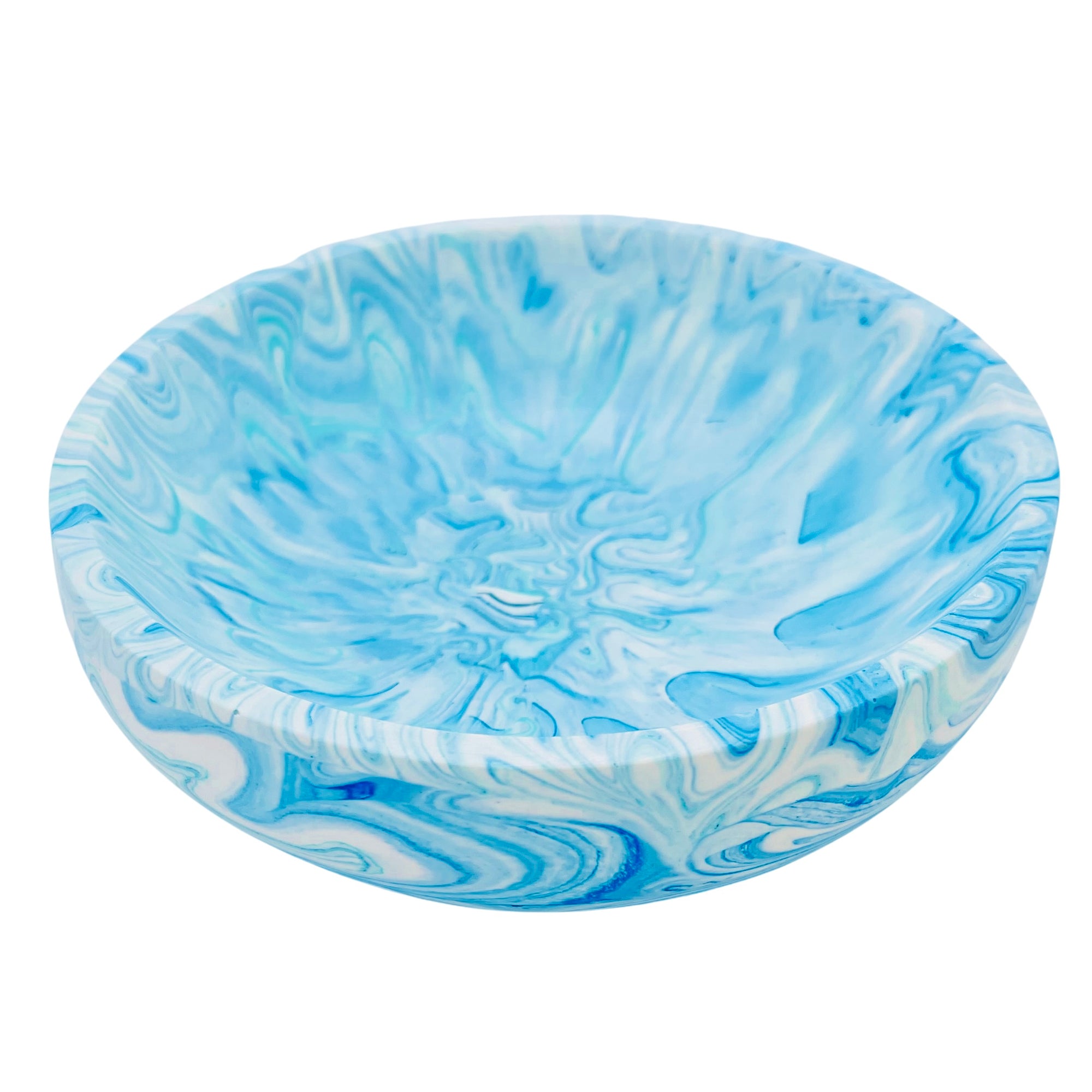 A shallow medium size Jesmonite bowl marbled with magenta pigment.