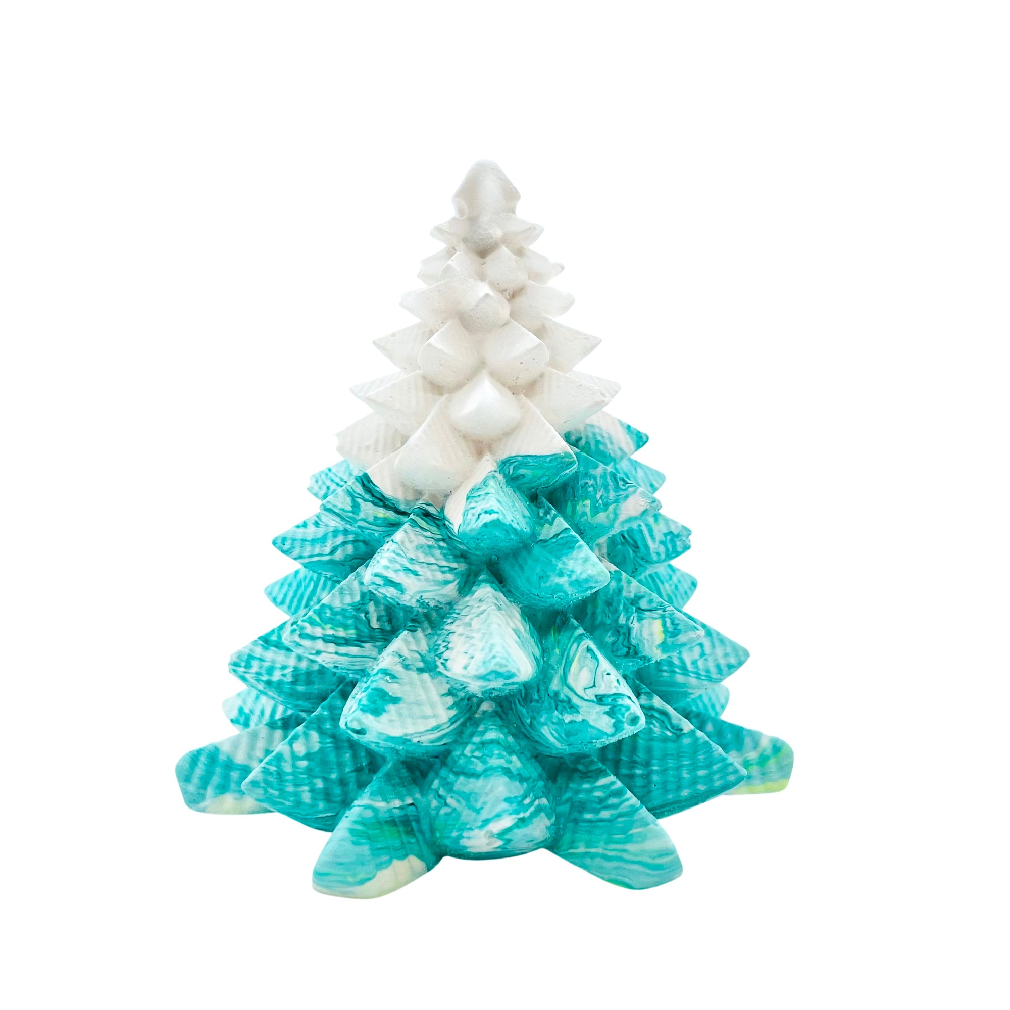 A small Jesmonite Christmas tree measuring 8.5cm tall and 7.5cm wide marbled with teal and white pigment.
