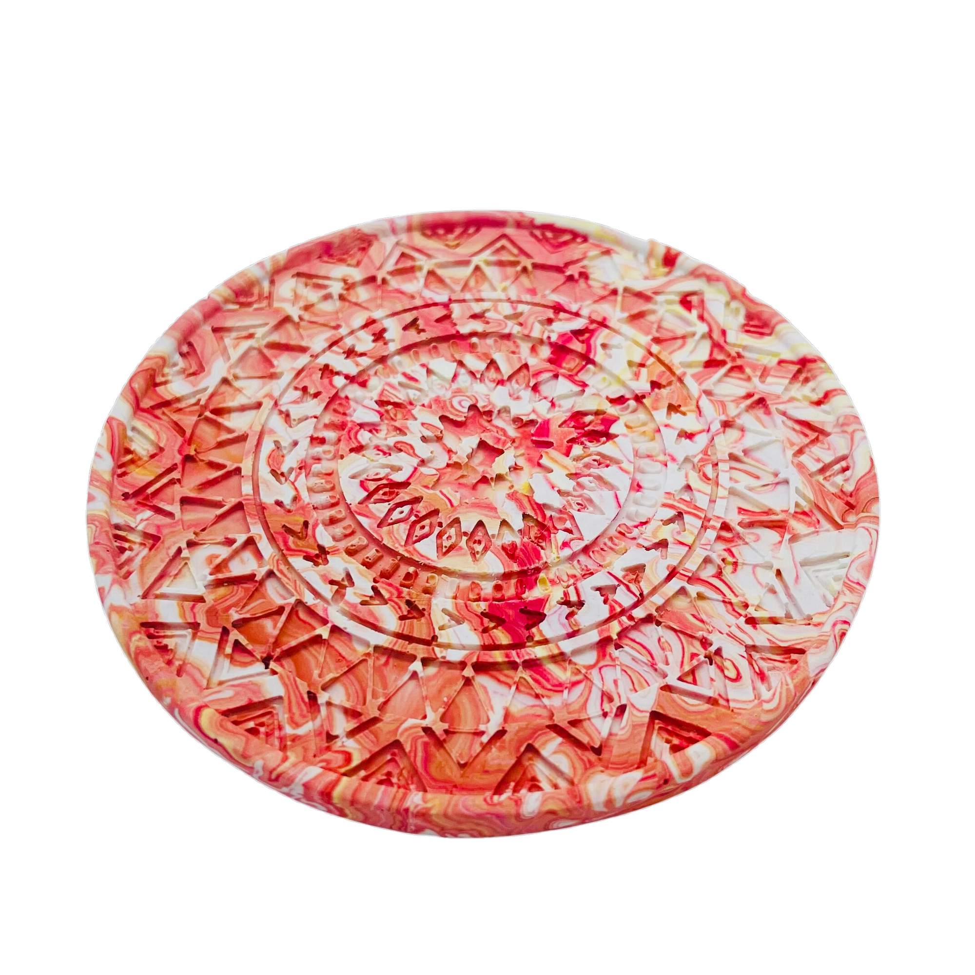A circular mandela coaster measuring 9.3cm in diameter and 0.8 cm in height marbled with coral pigment.
