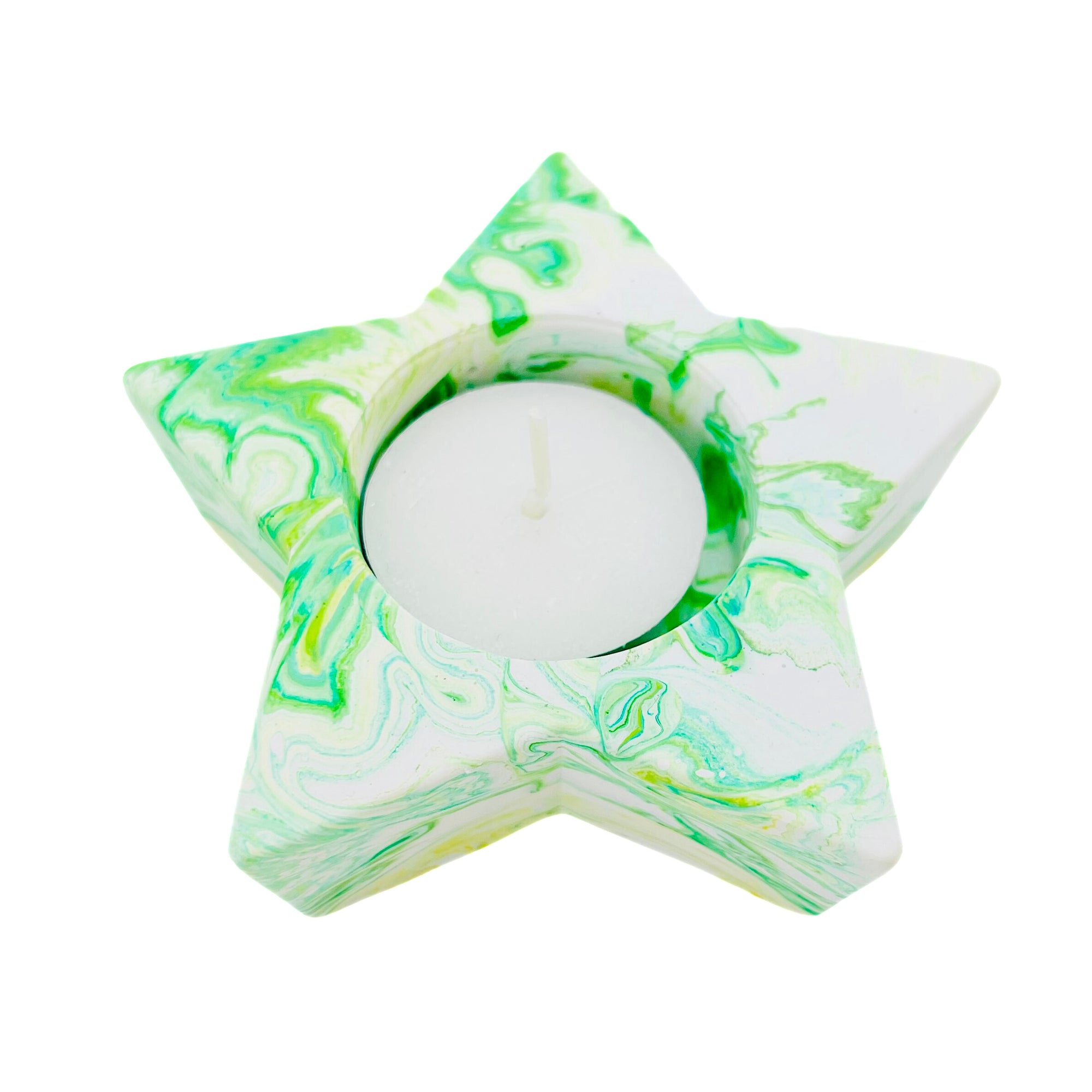 A star shaped Jesmonite tealight holder measuring 10cm in width and marbled with green pigment.