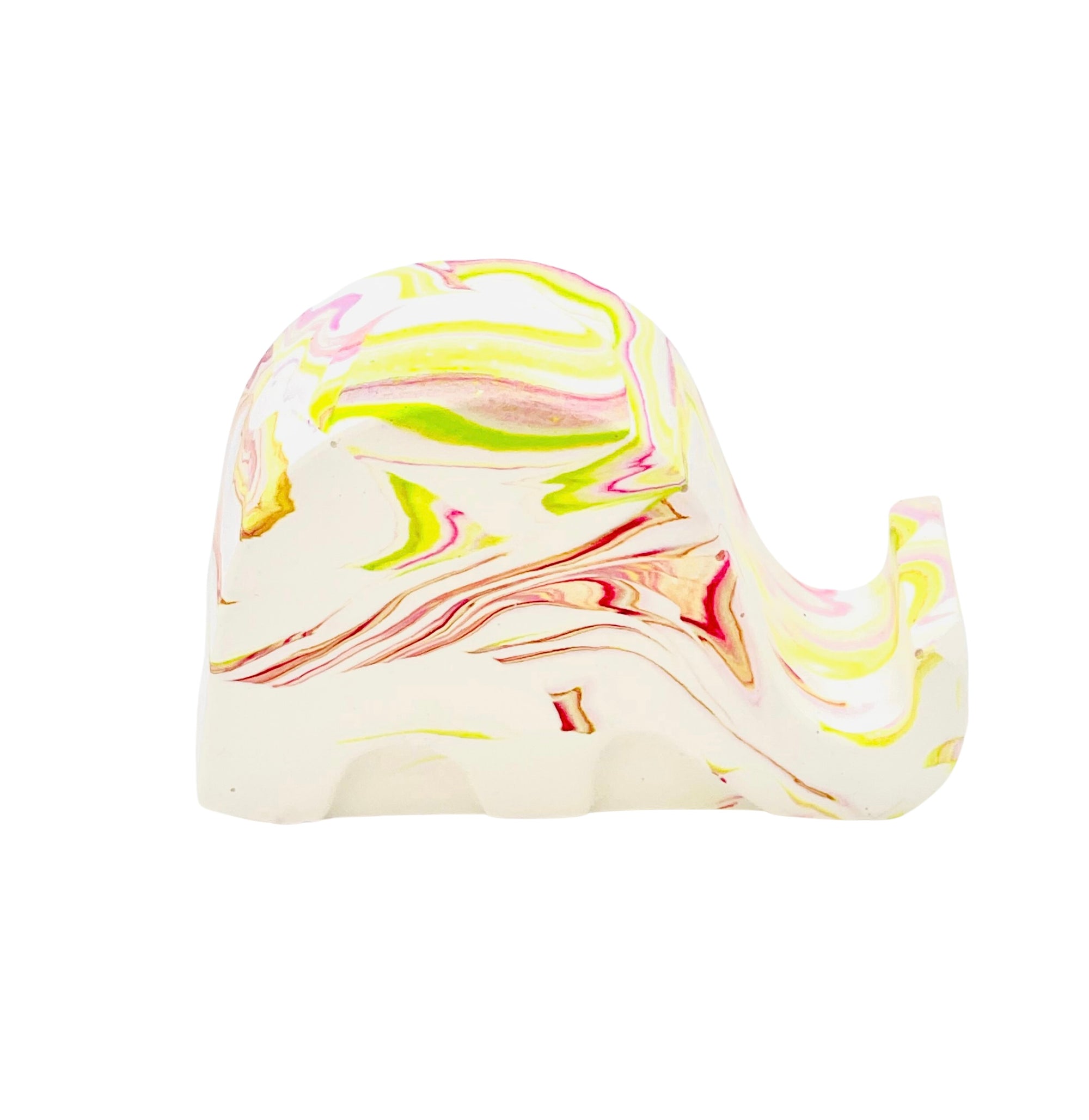 A Jesmonite elephant mobile phone stand measuring 6.5cm in length marbled with magenta and lime green pigment.