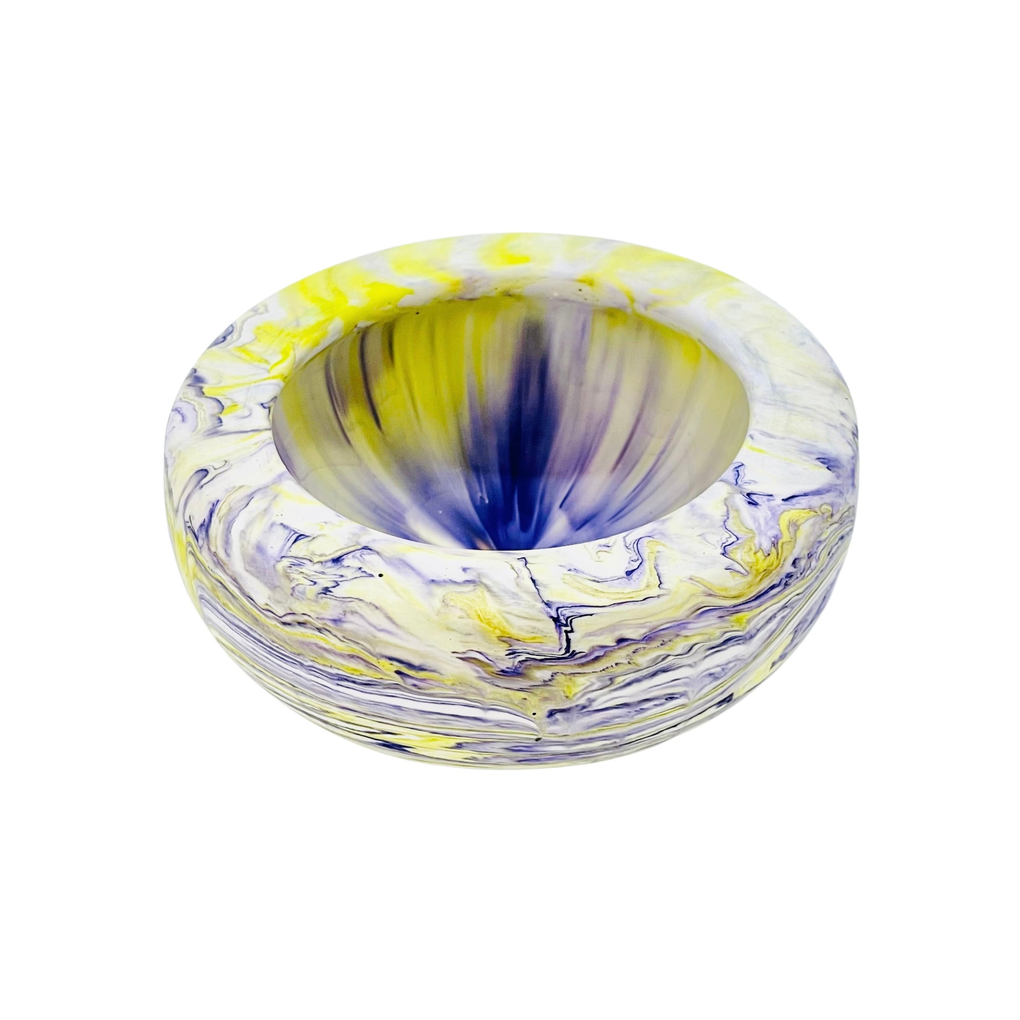 This small round jesmonite bowl measuring 10cm in diameter is marbled with purple and yellow pigment.