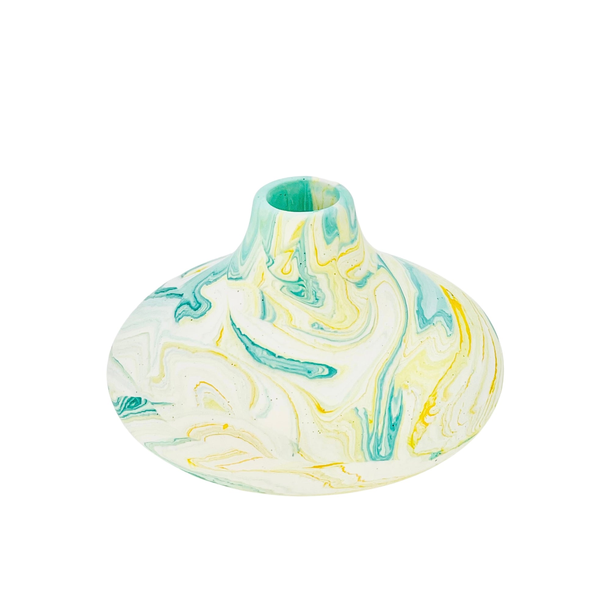 This small bulbous Jesmonite vase is marbled with turquoise and yellow pigment.