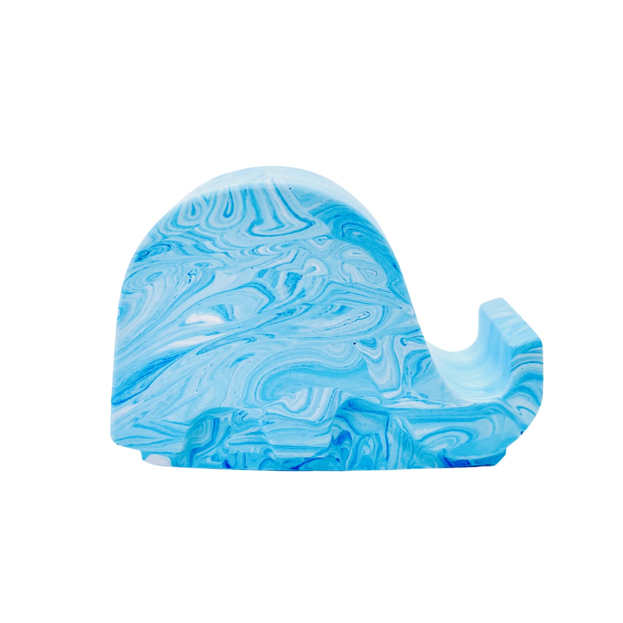 A Jesmonite elephant mobile phone stand measuring 6.5cm in length marbled with blue pigment.