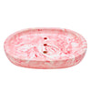 This oval Jesmonite soapdish measures 13.3cm in length and is marbled with red pigment.
